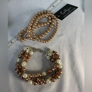Four neutral champagne beige colored bracelets